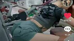 The asian girl stretches during her workout routine