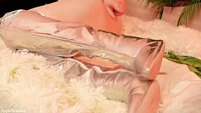 Intriguing jerk off instructions from Arya Grander in silver thigh high boots.