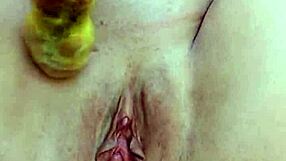 Is Velvet Rain 23 getting fucked with huge toys on the balcony?