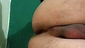 bisexual man engages in detailed dildo play during gay toy session