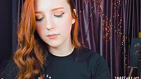 Amazing Redhead Blows Herself!