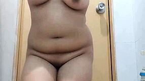 asian lady dances solo in a graceful performance