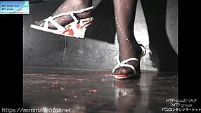 Rina-15 Displays Stockings and Pantyhose on Legs in Anime Image