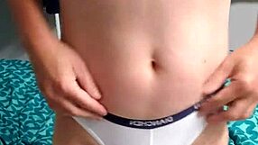 A young gay man in underwear