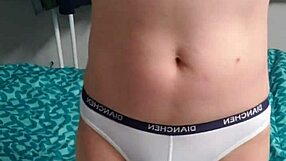 A young gay man in underwear