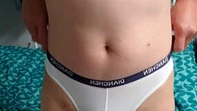 A young gay man in underwear