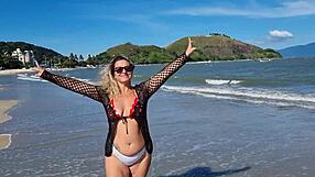 I admire Lisa Aranha in her bikini on the beach, looking so attractive.