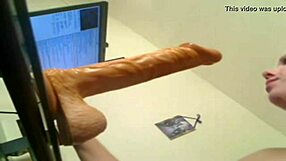 blonde deep throats huge dildo with cum