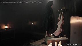 natural busty woman tied up in bizarre bondage scene