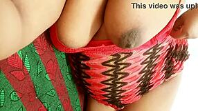 Asian aunty displays her large breasts in a casual setting.