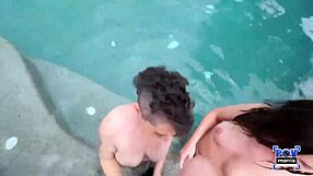 Close interaction with gorgeous women whom engage in oral sex in a pool environment