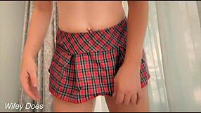 Wife teasingly lifts her short skirt to show off her ass and big tits