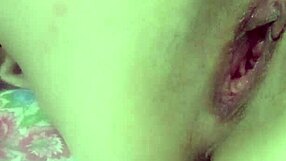 mature woman engages in close-up intimate activities with amateurs at home