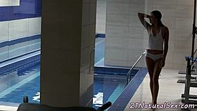 this smalltits babe is casually masturbating by the pool, fingering herself