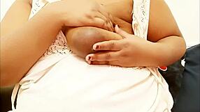 A half nude, Indian maid showing her big bosom