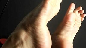 mature woman shows off super high arches