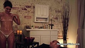 Masseuse oils up her body before teasing and playing with hard cock