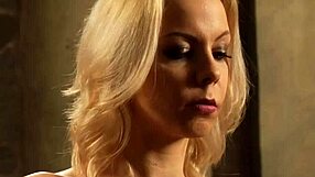 A turned on lesbian submissive mistresses self-pleasures herself and orgasms while confined