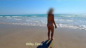 hey babe, watch my wife strip fully nude at this public beach