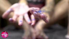 cute girl passionately plays with glitters and gives footjob to big dildo