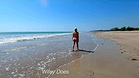 hey babe, watch my wife strip fully nude at this public beach