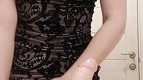 Milf sucks dildo while caressing wet pussy in restroom