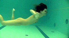 Beautiful teen Natalia Kupalka swims naked with an exquisite body in the pool