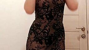 Milf sucks dildo while caressing wet pussy in restroom