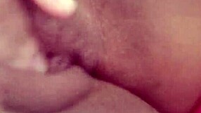 Beautiful woman masturbates in bed with wet pussy