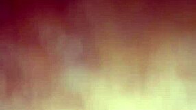 Ann's lips wrapped around a massive black cock in intense sucking. The contrast is thrilling.