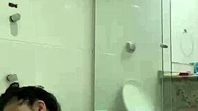 Hot brunette bia masturbates with shower jet