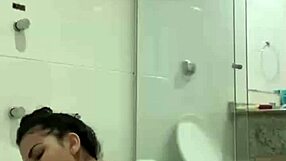 Hot brunette bia masturbates with shower jet