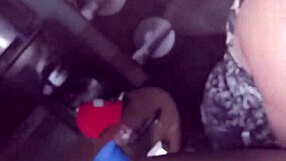 Ann's lips wrapped around a massive black cock in intense sucking. The contrast is thrilling.