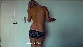 wife casually strips out of her tight denim shorts