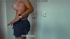 wife casually strips out of her tight denim shorts