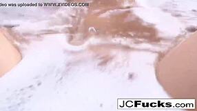 Bubble bath fun with sexy redhead Jayden masturbating her big tits and pussy!