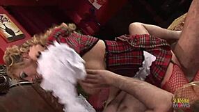 Babe in plaid uniform sucking and riding a long dong