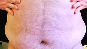 chubby gay man flaunts his body in hot clips.