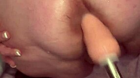 Amateur brunette stretches ass with machine for first time