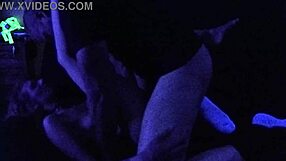 Carrie B endures face fucking and choking in blacklight fuck fest