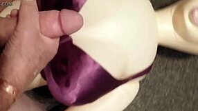 Dolly the Fuck Doll Gives Handjob Fun Leading to Cumshot on Bra