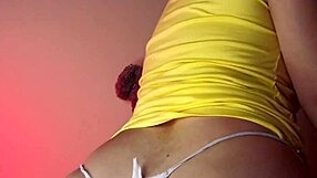 Curvy brunette bodybuilder plays with dildo until wet