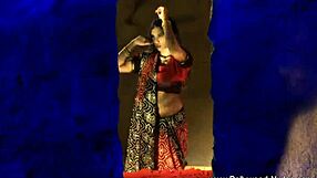 Exotic lover mystery dancer performs solo on stage.