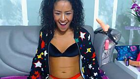 curly teen messing with her panties on webcam