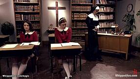 Lezdom nun whips sexy tied-up students