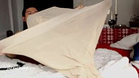 Exploring Skin-Colored Torn Stockings in a Fetish Video Scene. Perfect for Fans of Unique Styles.