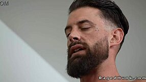 Two heavily tattooed muscular men sharing a house fuck without a condom on camera