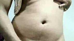 The TRAVESTI is MASTURBATING nicely at home.