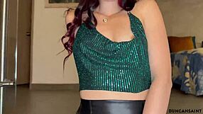 Athletic latina babe in miniskirt and high heels giving blowjob.