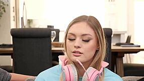 Sexy gamer girl enjoys facial cumshot in a gang bang